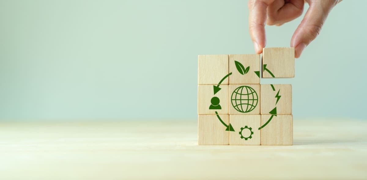 Wooden blocks stacked on top of each other showing sustainability