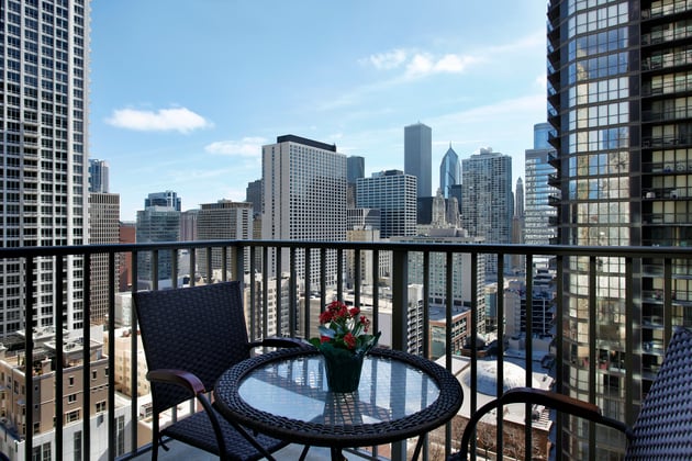 City view from condo balcony, types of Detroit investment properties concept. 