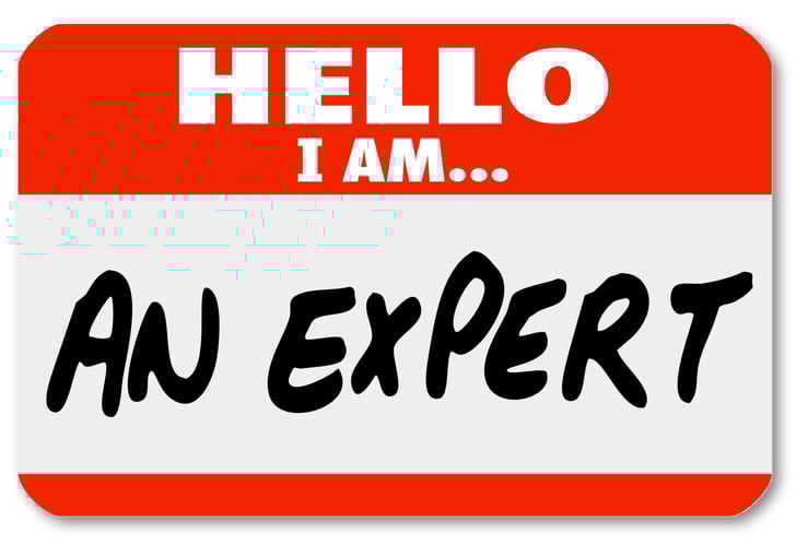 Sticker tag with hello I am an expert written