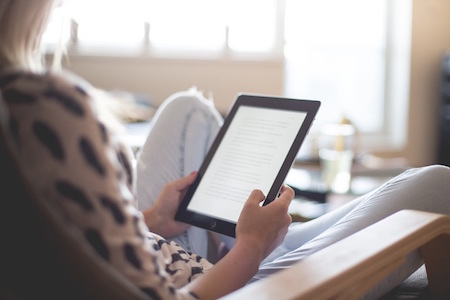 woman-read-tablet-relax