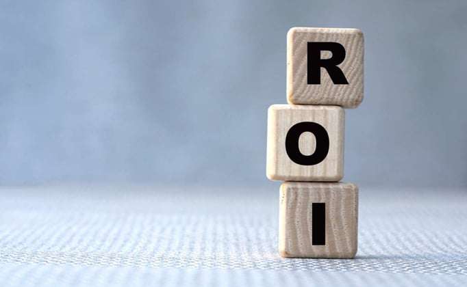 ROI spelled in wooden blocks