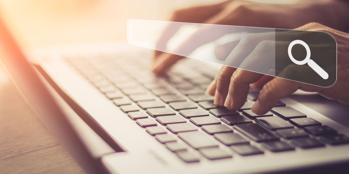 Businesswoman using laptop searching Browsing Internet Data Information